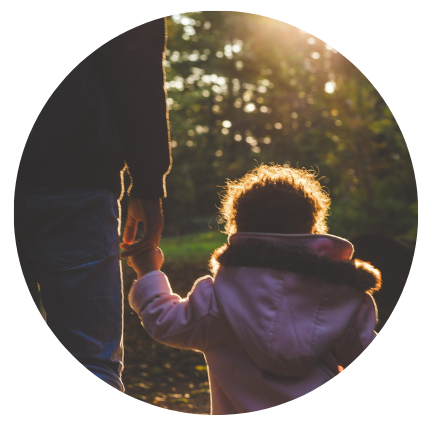 GH Header a kid holding a finger of a parent